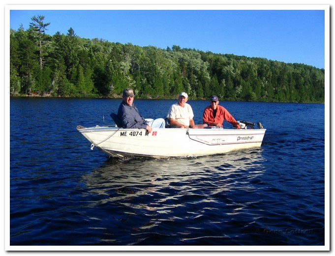 3 men in a boat